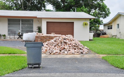 Environmentally friendly enclosed skip in use